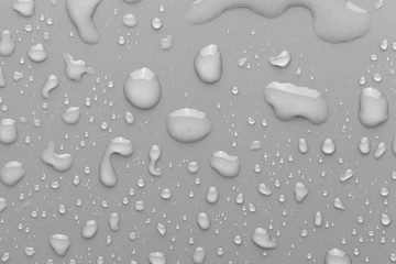 Drops of water on a color background