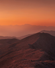 Fototapeta na wymiar Beautiful sunset over Taurus Mountains from the top of Tahtali Mountain near Kemer, Antalya, Turkey