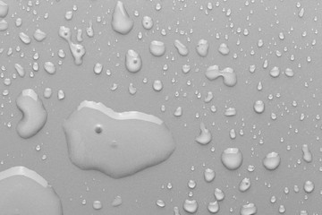Drops of water on a color background