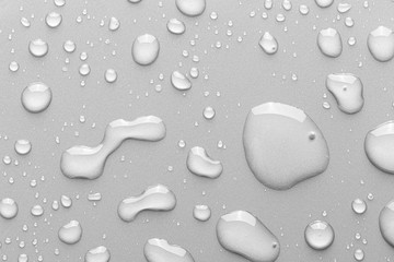 Drops of water on a color background.