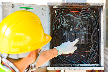 Officials checking the cause of the fire control circuit board