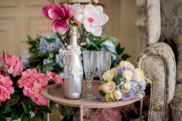 wedding glasses and wedding decor with flowers