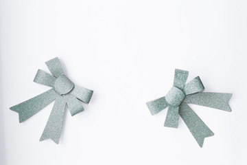 silver bows isolated on white background with copy space. Christmas bow. New Year 2020. Presents