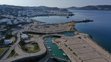 Aerial drone panoramic photo of picturesque old port in main village of Mykonos island at sunrise...