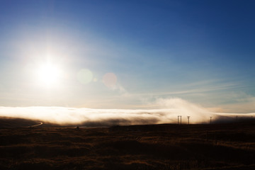Naklejka na ściany i meble Incredible clouds on a dramatic landscape of Iceland
