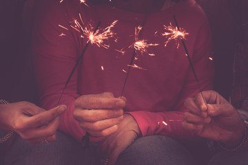 Close up of unrecognizable group of people friends celebrating together christmas time or new year...
