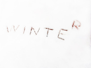 The inscription Winter in the snow.