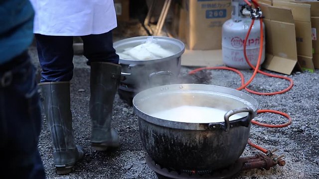 Stir and scoop Amazake, sweet Sake, fermented Japanese Rice Drink