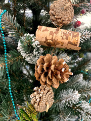 Christmas toys and decorations. Christmas and New Year background. Lanterns and balls, beads on the branches of a Christmas tree. Banner for the Christmas holidays.