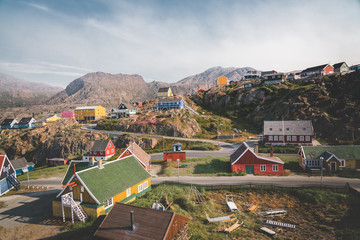 Colourful little Arctic town Sisimiut in Greenland,Qeqqata Municipality, aka Holsteinsborg . Second largest city in Greenland. Overview of port area and Sisimiut Museum, a collection of historic © Mathias