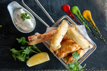  deep fried seafood in a basket