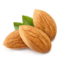 Obraz na płótnie Canvas Three almonds with leaves, isolated on white background