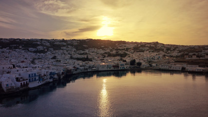 Aerial drone panoramic photo of picturesque old port in main village of Mykonos island at sunrise with beautiful colours, Cyclades, Greece