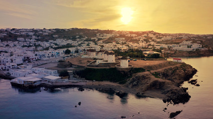 Aerial drone panoramic photo of picturesque old port in main village of Mykonos island at sunrise...