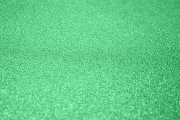 Abstract blur green glitter sparkle defocused bokeh light background