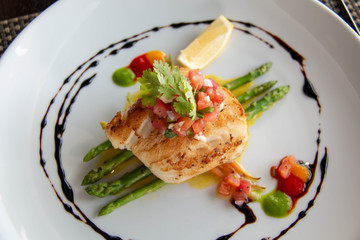  delicious fish steak on white plate