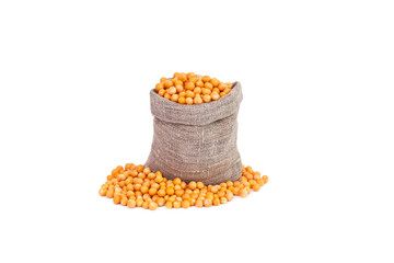  Dried peas in a canvas bag on a white background