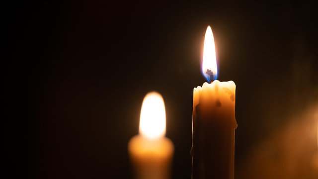 close up candle light in the dark macro photography texture background