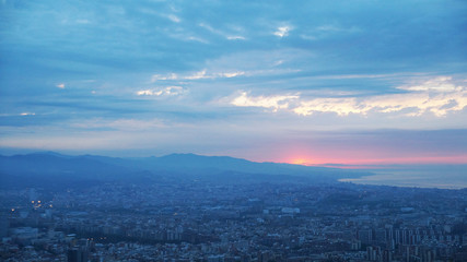 Dawn in Barcelona in the spring. View of Barcelona in the morning from the bunker