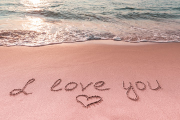 Valentine's day on the beach. Love message and heart on the beach. Travel and holidays concept. Space for text.