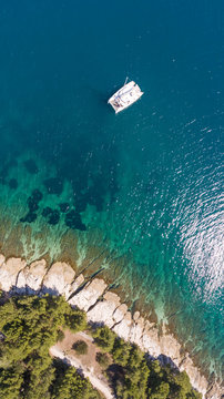 Aerial view of a sailing boat anchored near the shore, Mali Lo?inj, Croatia.