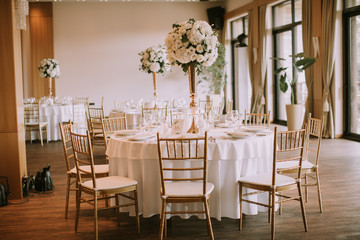 Wedding banquet tables with flowers decoration