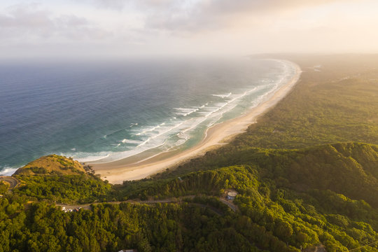 Aerial view of hidden beach at Cape Byron during the sunset, Australia.