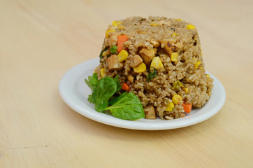 A eating fried rice plate