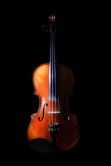 Fototapeta na wymiar Instrument Violin on black background