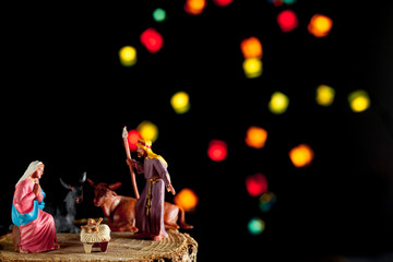 Christmas Manger scene with Jesus, Mary and Joseph on black