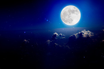 Fototapeta na wymiar Full moon with starry and clouds background. Romantic night.