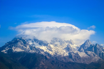 Fototapeta na wymiar Panoramic view of Jade Dragon Snow Mountain in Lijiang, Yunnan, China