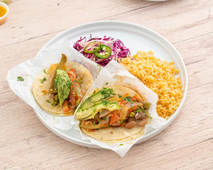 Vegetarian Mexican food. Veggie tacos, rice bowls, and enchiladas. 
