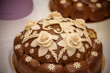 Traditional wedding Ukrainian bread Korovai with flowers