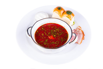 Meat borsch with sour cream and garlic buns