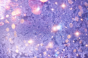 Christmas and New Year holidays background with frost patterns. Glitter lights backdrop. Winter season. Text space. Elements of this Image Furnished by NASA.