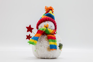 Christmas toy snowman on a white background