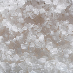 Pure crystals of sea salt. Food product. Macro