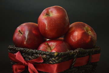 Red Apples In Brown Basket Whole And Cut