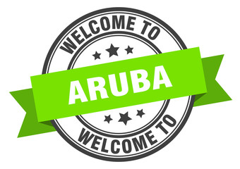 Aruba stamp. welcome to Aruba green sign