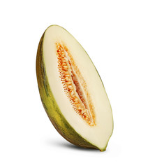 Half of delicious green tendral melon in cross-section, isolated on white background with copy space for text or images. Side view. Close-up shot.