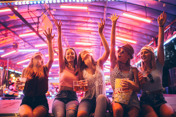 Female friends having fun at the festival