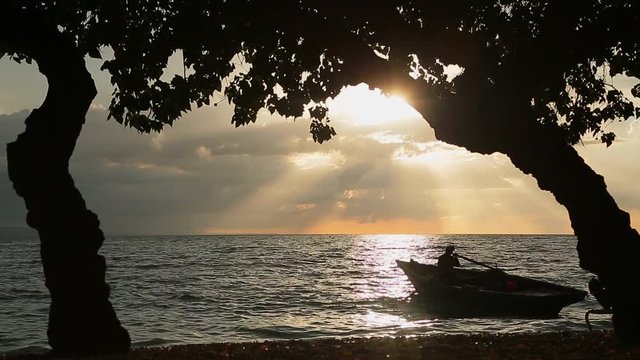 boat sunset on beach in haiti
