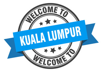 Kuala Lumpur stamp. welcome to Kuala Lumpur blue sign
