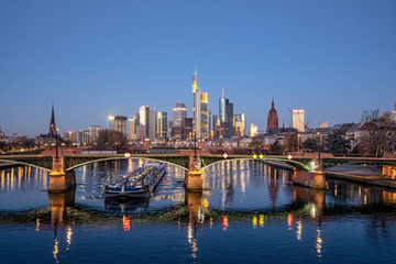 Fototapeta na wymiar Frankfurt am Main, Ignatz-Bubis-Brücke, Cargo Ship, Skyline, Germany