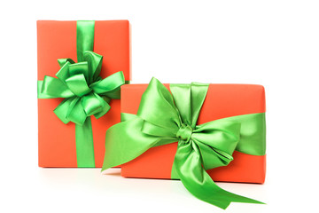 Gift boxes with ribbons isolated on white background