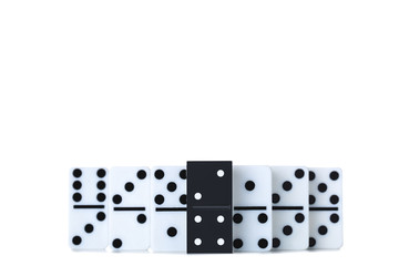 Leader concept. Domino tiles on white background