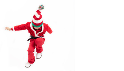 Boy Santa Claus is jumping. Christmas holidays concept. Christmas child