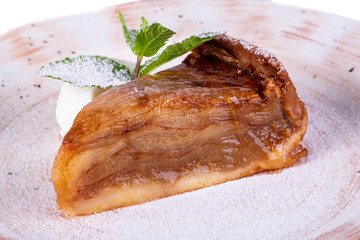 Apple jam pie with mint leaves and ice cream ball