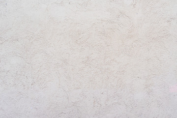 Texture of gray stucco wall. Finishing construction work. Patterned background.